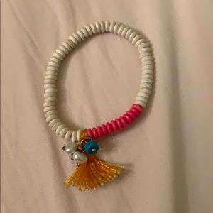 Beaded bracelet with tassels and pearls